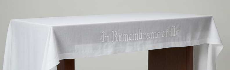 Text 'In Remembrance of Me' for a table top
