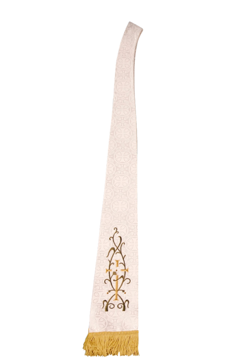 Long, narrow fabric with embroidered design and gold fringes on a white background