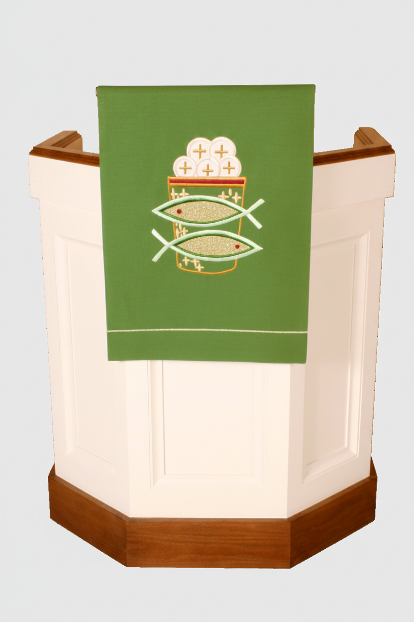 Pulpit with a green cloth featuring religious symbols on a white background