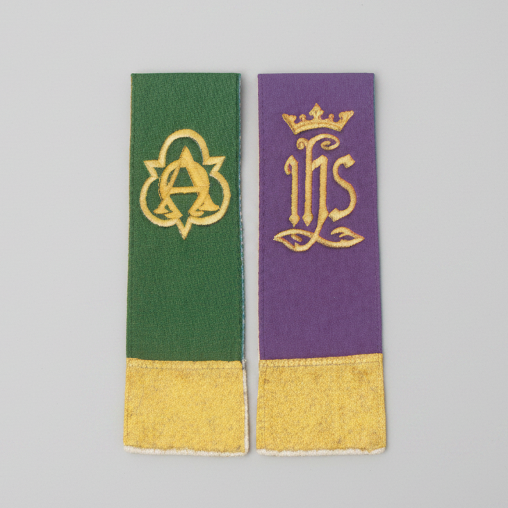 Two bookmarks with green, purple, and yellow design on a white background
