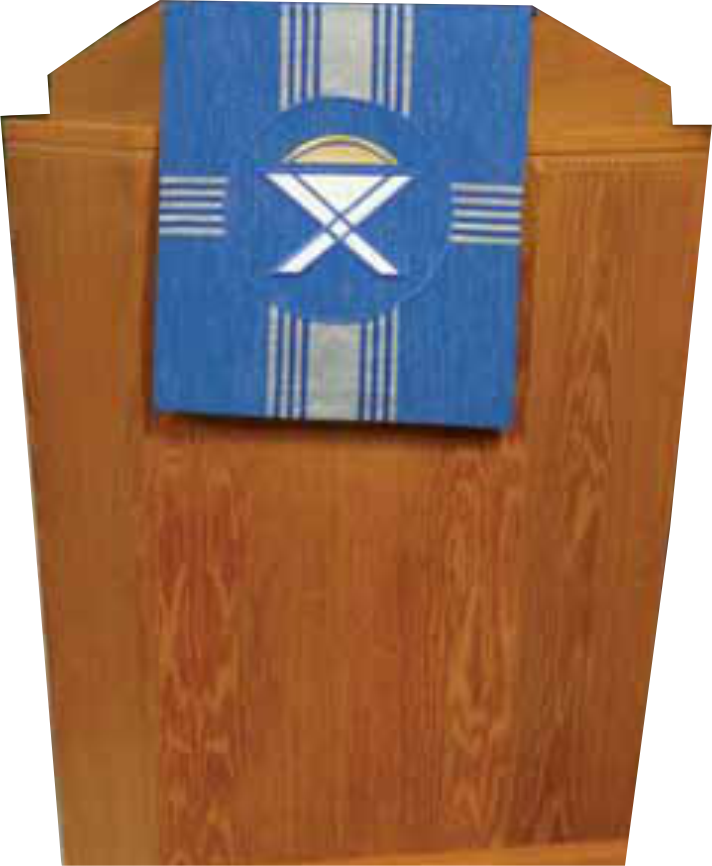 Wooden lectern with a blue and white decorative cloth draped over it