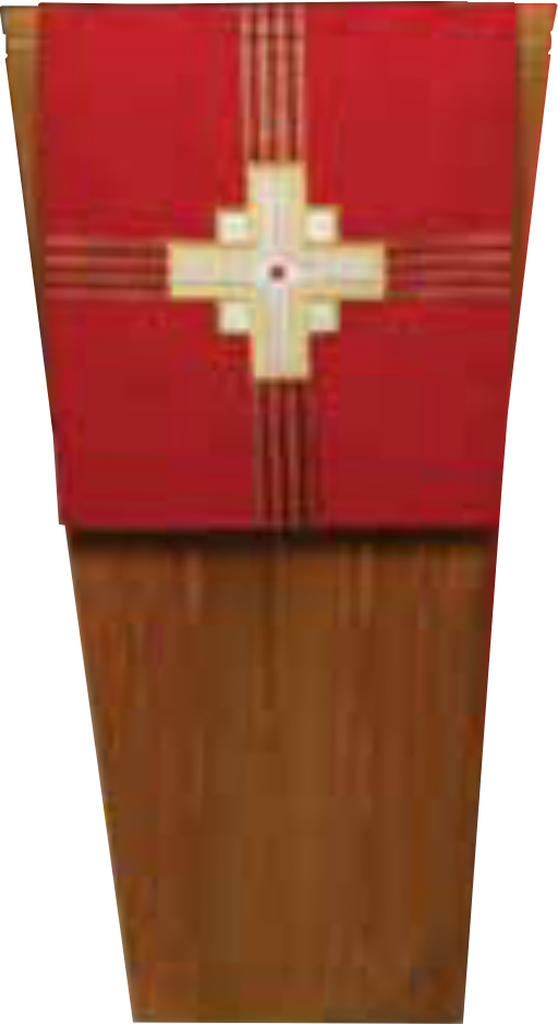 Red fabric with a gold cross on a wooden background