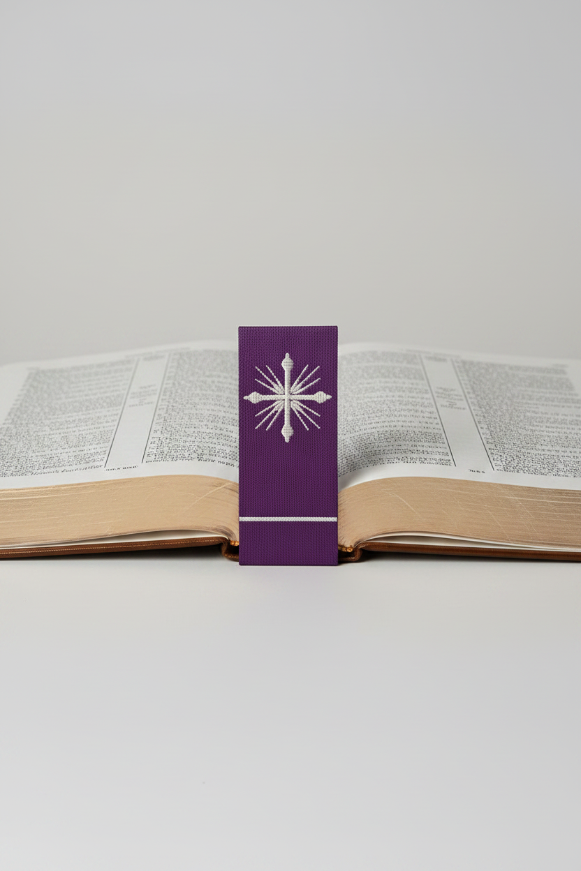 Purple ribbon with a gold cross design on a white background