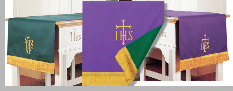 Set of church altar cloths with IHS symbol in green, purple, and white.